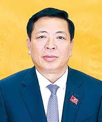 'A person in a suit

AI-generated content may be incorrect.'